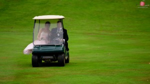 Bride and groom in golf buggy shot with Nikon D810